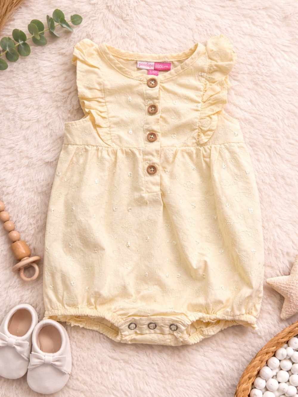 Penelope Mack | Pale Yellow | Eyelet Romper with Wood-Look Buttons | 6-9 M